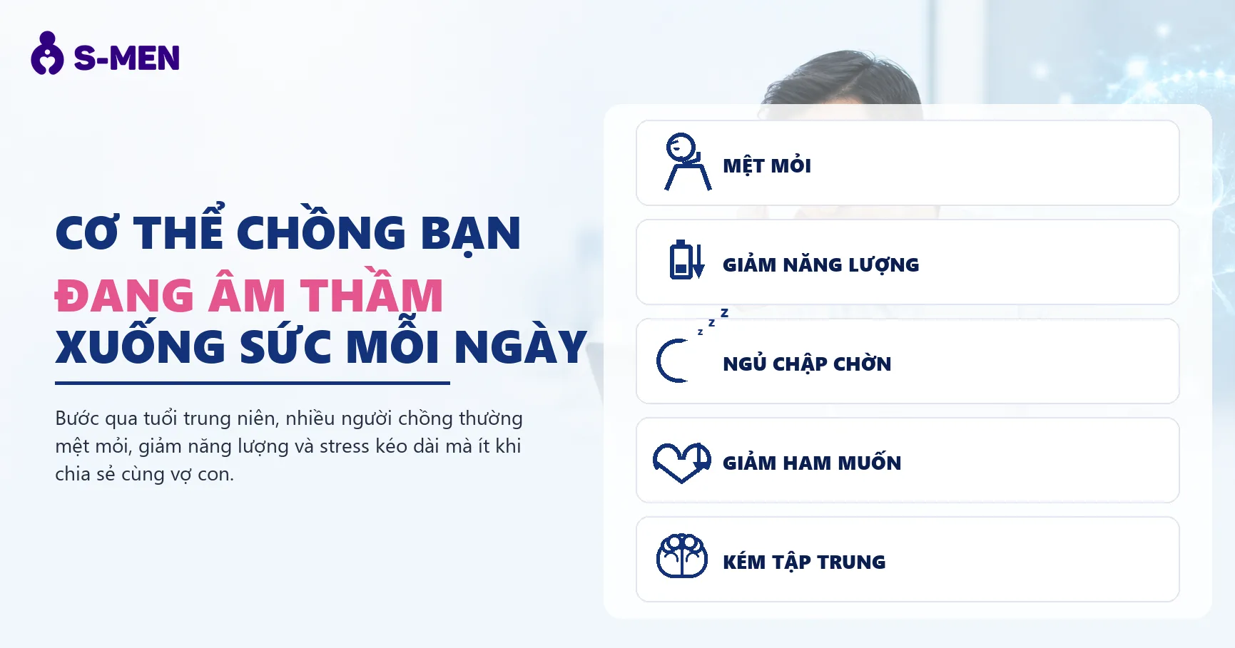 Người đàn ông mệt mỏi bên laptop, đồ hoạ năng lượng mờ phía sau